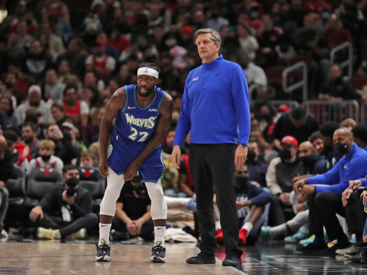 Minnesota Timberwolves guard Patrick Beverley (22) talks with coach Chris Finch